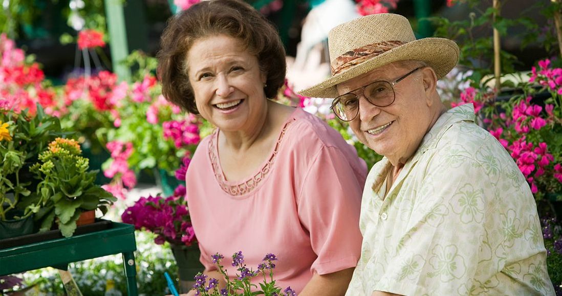 hispanic senior citizen couple at the garden